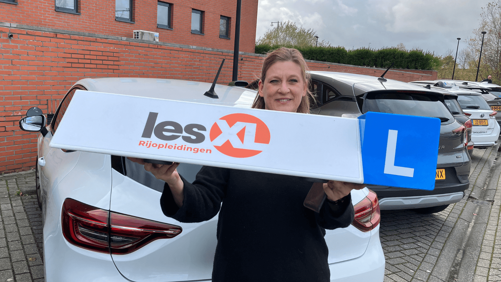 rijles auto amsterdam geslaagd